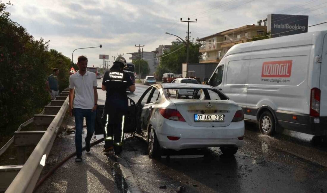 Antalya’nın Serik ilçesinde seyir halindeyken aniden alev alan otomobil, itfaiye
