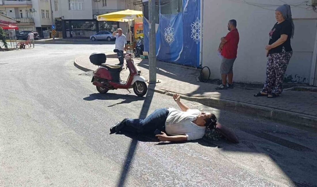 Antalya’nın Manavgat ilçesinde dökülen sıvı nedeniyle kayganlaşan yolda devrilen motosiklet