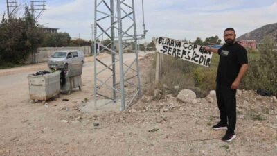 Hatay’da evinin yanı başında bulunan araziye çöp atanlara laf anlatamayan