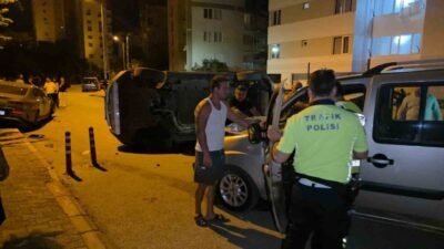 Antalya’nın Muratpaşa ilçesinde sürücüsünün direksiyon hakimiyetini kaybettiği otomobil takla atarak