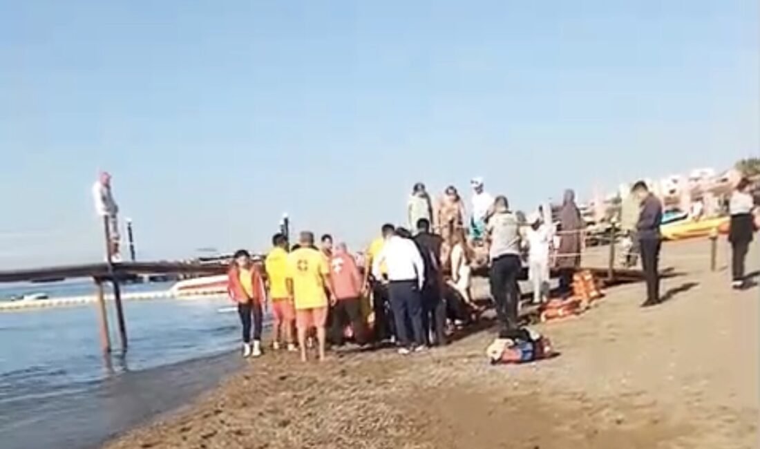 Serik ilçesine bağlı Boğazkent'te otel sahilinden denize giren 77 yaşındaki